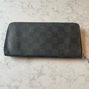 LV Damier graphite zippy wallet.